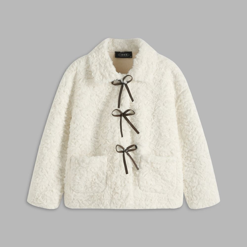 Cider plush bow coat. Faux cream fur with dark brown bows sz m, like new